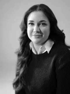 Black and white portrait of Candidate Appraiser Alexis Kelly, smiling